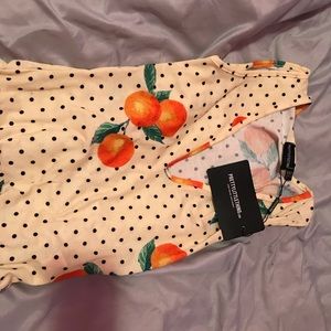 ((Snaps at the bottom like baby clothing))